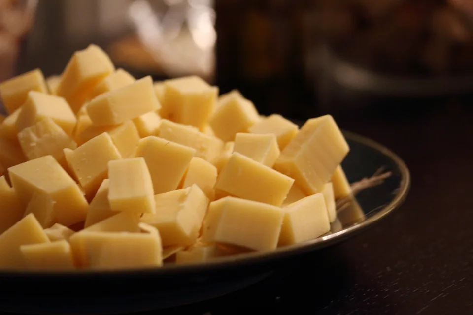 Cheese for a Savoyard fondue — an illustration of local specialities